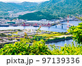 広島市東部方面の市街地遠景です。海田大橋、矢野町、坂町の一部が見えます。手前側は浄化センターです。 97139336