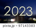 【背景素材】夜景と2023年の文字 97143383