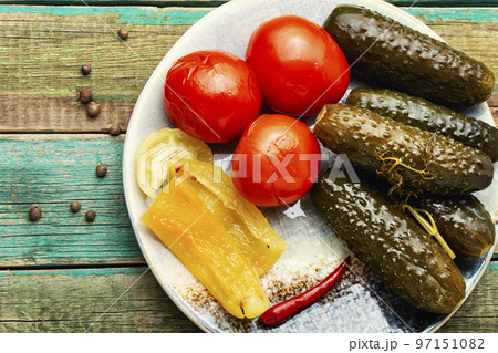 Tasty homemade pickles vegetables. Tasty homemade pickles vegetables. 97151082