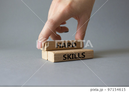 Hard skills symbol. Wooden blocks with words Hard skills. Beautiful grey background. Businessman hand. Businessman hand. Business and Hard skills concept. Copy space Hard skills symbol. Wooden blocks with words Hard skills. Beautiful grey background. Businessman hand. Businessman hand. Business and Hard skills concept. Copy space 97154615