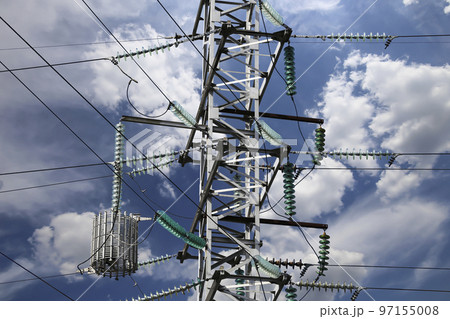 Electricity pylon (high voltage power line) on the background of the cloudy sky 97155008