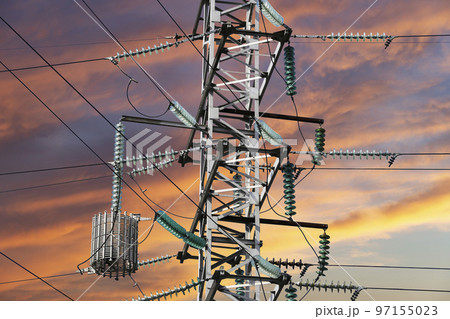 Electricity pylon (high voltage power line) against the background of a romantic evening sky Electricity pylon (high voltage power line) against the background of a romantic evening sky 97155023