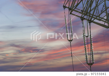Electricity pylon (high voltage power line) against the background of a romantic evening sky Electricity pylon (high voltage power line) against the background of a romantic evening sky 97155041