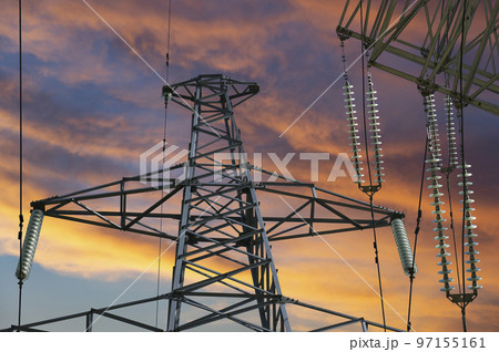 Electricity pylon (high voltage power line) against the background of a romantic evening sky Electricity pylon (high voltage power line) against the background of a romantic evening sky 97155161