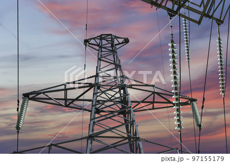Electricity pylon (high voltage power line) against the background of a romantic evening sky 97155179