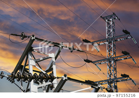 Electricity pylon (high voltage power line) against the background of a romantic evening sky 97155216