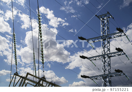 Electricity pylon (high voltage power line) on the background of the cloudy sky 97155221