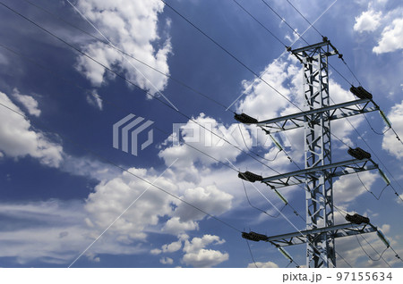 Electricity pylon (high voltage power line) on the background of the cloudy sky 97155634