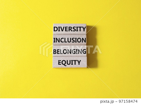 Diversity Inclusion Belonging Equity symbol. Concept words Diversity Inclusion Belonging Equity on wooden blocks. Beautiful yellow background. Business concept. Copy space. Diversity Inclusion Belonging Equity symbol. Concept words Diversity Inclusion Belonging Equity on wooden blocks. Beautiful yellow background. Business concept. Copy space. 97158474