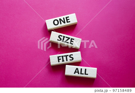 One size fits all symbol. Concept words One size fits all on wooden blocks. Beautiful red background. Business and One size fits all concept. Copy space. 97158489