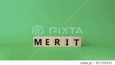 Merit symbol. Concept word Merit on wooden cubes. Beautiful green background. Business and Merit concept. Copy space. Merit symbol. Concept word Merit on wooden cubes. Beautiful green background. Business and Merit concept. Copy space. 97159341