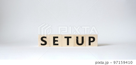 Setup symbol. Wooden cubes with word Setup. Beautiful white background. Setup concept. Copy space. Setup symbol. Wooden cubes with word Setup. Beautiful white background. Setup concept. Copy space. 97159410