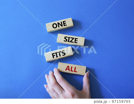 One size fits all symbol. Concept words One size fits all on wooden blocks. Beautiful blue background. Businessman hand. Business and One size fits all concept. Copy space. One size fits all symbol. Concept words One size fits all on wooden blocks. Beautiful blue background. Businessman hand. Business and One size fits all concept. Copy space. 97159705