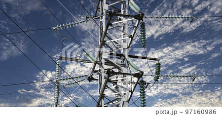 Electricity pylon (high voltage power line) on the background of the cloudy sky Electricity pylon (high voltage power line) on the background of the cloudy sky 97160986
