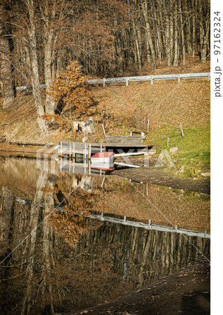 Water reservoir Pocuvadlo in Stiavnica Mountains, Slovakia, seasonal natural scene Water reservoir Pocuvadlo in Stiavnica Mountains, Slovakia, seasonal natural scene 97162324