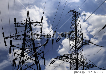 Electricity pylon (high voltage power line), black contour, on the background of the cloudy sky Electricity pylon (high voltage power line), black contour, on the background of the cloudy sky 97163357