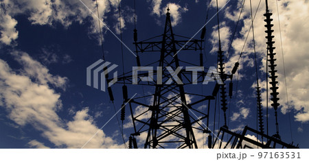 Electricity pylon (high voltage power line), black contour,  against the background of a romantic evening sky 97163531