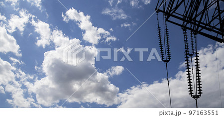 Electricity pylon (high voltage power line), black contour, on the background of the cloudy sky Electricity pylon (high voltage power line), black contour, on the background of the cloudy sky 97163551