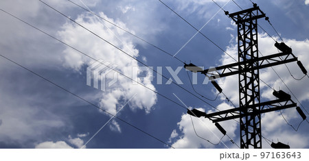 Electricity pylon (high voltage power line), black contour, on the background of the cloudy sky Electricity pylon (high voltage power line), black contour, on the background of the cloudy sky 97163643