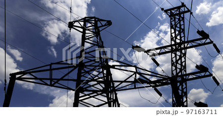 Electricity pylon (high voltage power line), black contour, on the background of the cloudy sky Electricity pylon (high voltage power line), black contour, on the background of the cloudy sky 97163711