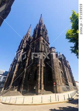 Towering over Clermont-Ferrand city gothic cathedral Notre-Dame-de-l'Assomption, France Towering over Clermont-Ferrand city gothic cathedral Notre-Dame-de-l'Assomption, France 97169959