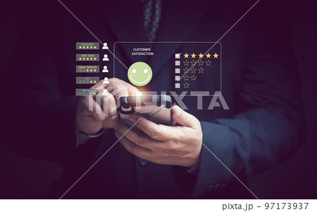 Business people rate their excellent satisfaction press the smiley face The concept of customer ratings and reviews. service business and survey concept. 97173937