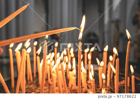 Close-up, candles in the temple on a blurred background. Close-up, candles in the temple on a blurred background. 97178622