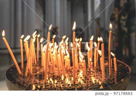 Close-up, candles in the temple on a blurred background. 97178663
