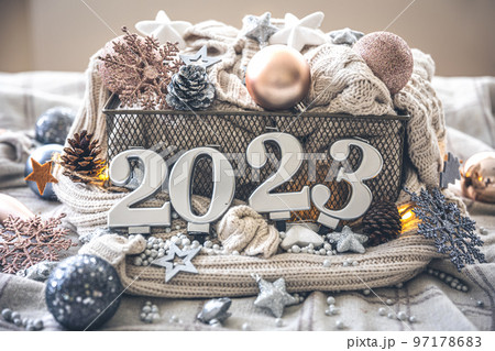 Christmas cozy background with numbers 2023 and decor details. Christmas cozy background with numbers 2023 and decor details. 97178683