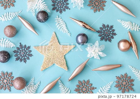 Flat lay, blue Christmas background with decor details. Flat lay, blue Christmas background with decor details. 97178724