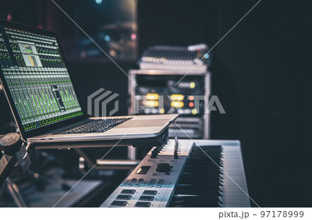 Laptop screen showing the interface of a music program. Working with sound. Laptop screen showing the interface of a music program. Working with sound. 97178999