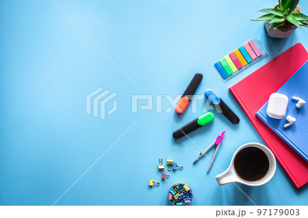 School supplies stationery on a blue background, copy space. 97179003