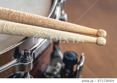 Close-up, drumsticks on a blurred background. Close-up, drumsticks on a blurred background. 97179004