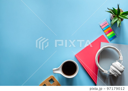 School supplies stationery on a blue background, copy space. 97179012