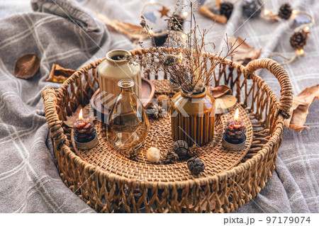Cozy autumn composition with decorative details, candles. 97179074