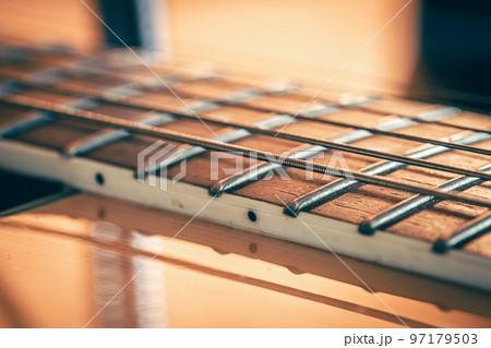 Strings on a classical acoustic guitar, macro shot. 97179503