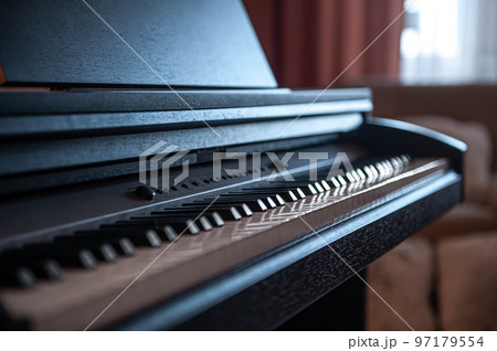 Close-up, keys of an electronic piano on a blurred background. Close-up, keys of an electronic piano on a blurred background. 97179554