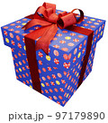 Christmas present of ball striped present with red ribbon 97179890