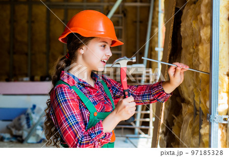 happy kid engineer with hammer tool in hard hat, engineering 97185328