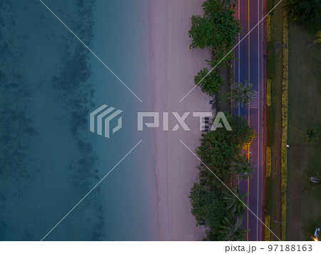Aerial view sandy beach and waves Beautiful tropical sea in sunset time, Summer season image by Aerial view drone shot, high angle view Top down sea beach Aerial view sandy beach and waves Beautiful tropical sea in sunset time, Summer season image by Aerial view drone shot, high angle view Top down sea beach 97188163