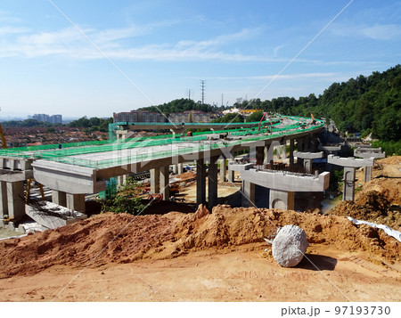 SELANGOR, MALAYSIA -JULY 6, 2022: An elevated road is under construction. Reinforced concrete is used for the structure. Construction is done in stages according to the sequence of works. 97193730