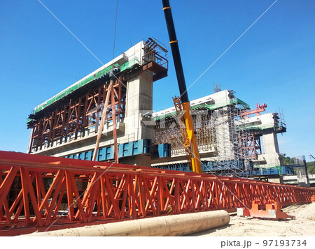 SELANGOR, MALAYSIA -JULY 6, 2022: An elevated road is under construction. Reinforced concrete is used for the structure. Construction is done in stages according to the sequence of works. 97193734