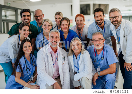 Portrait of happy doctors, nurses and other medical staff in hospital. 97195131