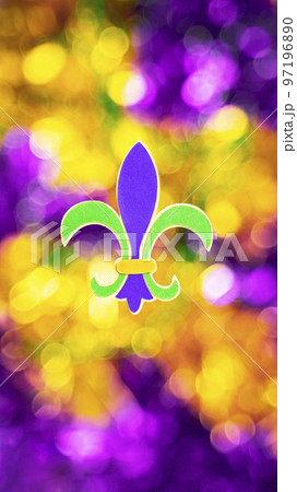 Mardi Gras concept background with selective focus and Fleur de lys Mardi Gras concept background with selective focus and Fleur de lys 97196890