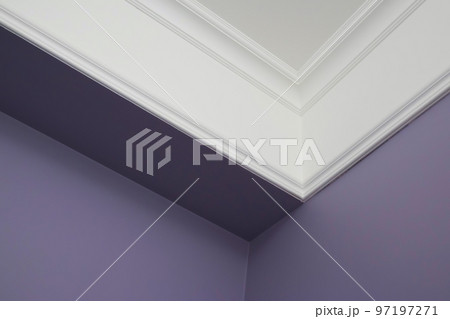 Ceiling moldings in the interior, detail of a angular ceiling skirting Ceiling moldings in the interior, detail of a angular ceiling skirting 97197271