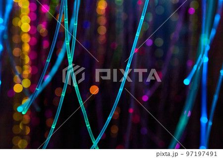 Strings of glowing neon lights in all colors Strings of glowing neon lights in all colors 97197491