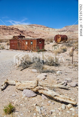 Union Pacific wooden train cart abandoned in sandy desert 97197492