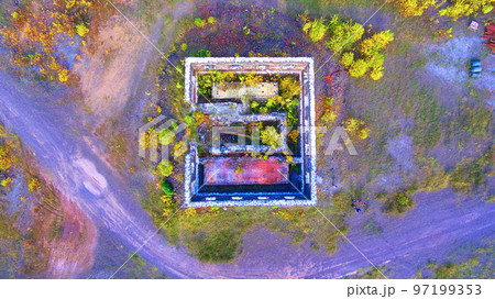 Aerial downward shot of old decayed building or structure Aerial downward shot of old decayed building or structure 97199353