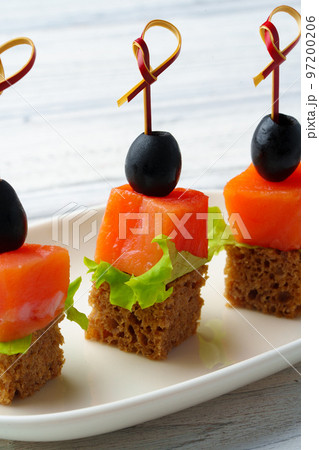Catering banquet table food snacks with fish Catering banquet table food snacks with fish 97200206