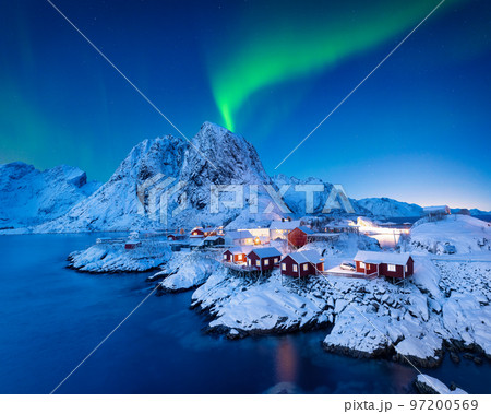 Aurora Borealis. Northern Lights. View on the house in the Hamnoy village, Lofoten Islands, Norway. 97200569
